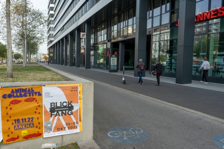 Radweg, Gehsteig, Bäume, und Bürogebäude am Wiedner Gürtel