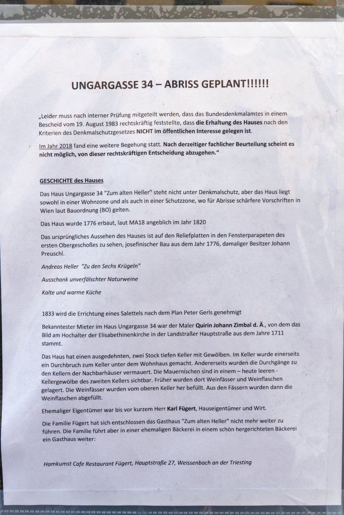 "Ungargasse 34 - Abriss geplant", Foto eines auf einem Haus aufgehängten A4-Zettels